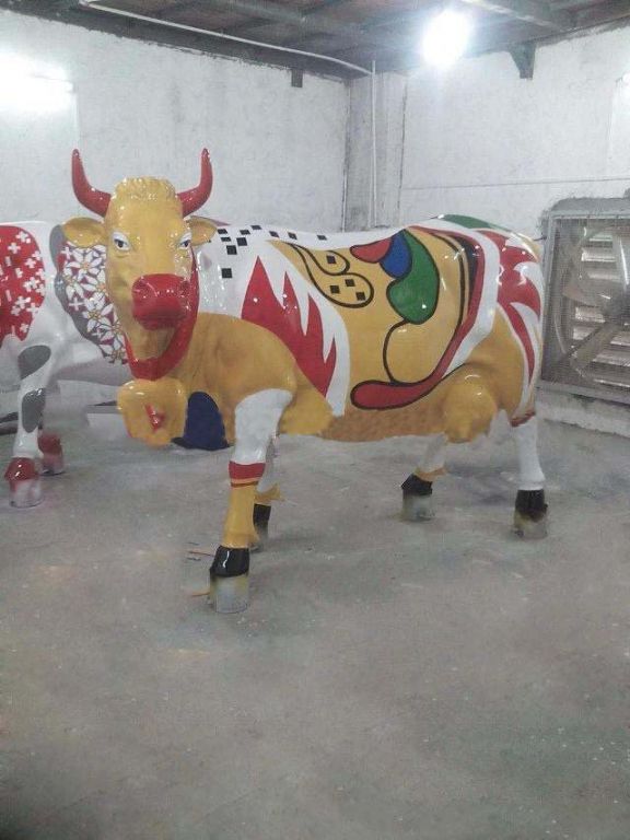 卡通牛雕塑在城市景觀中的作用是什么