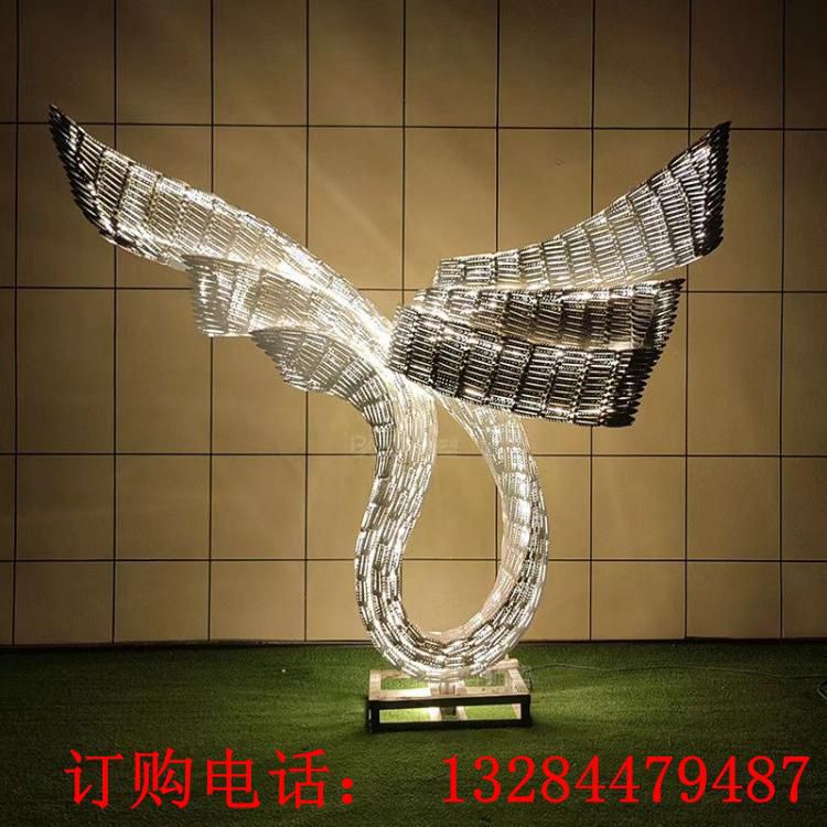 不銹鋼發(fā)光翅膀雕塑