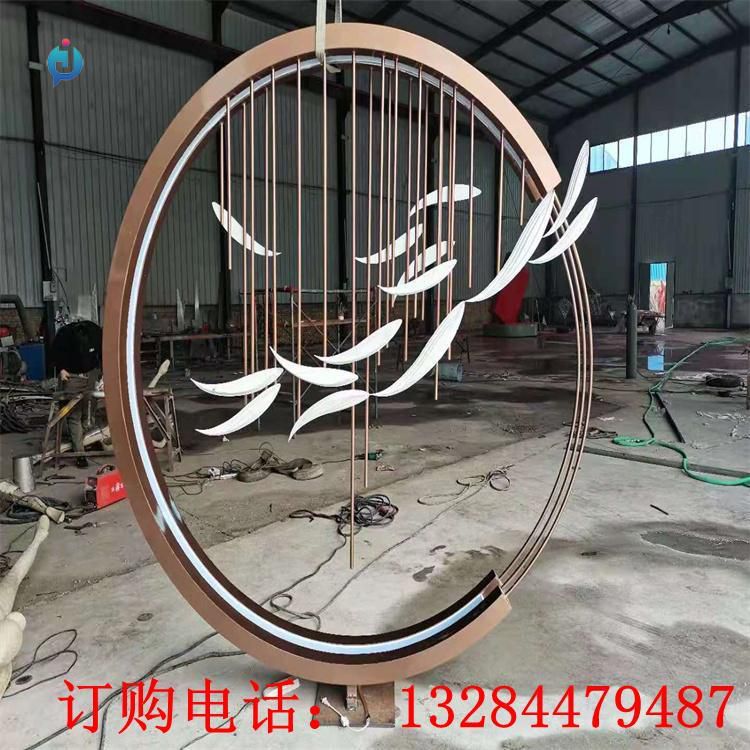 不銹鋼圓環(huán)切片魚群雕塑