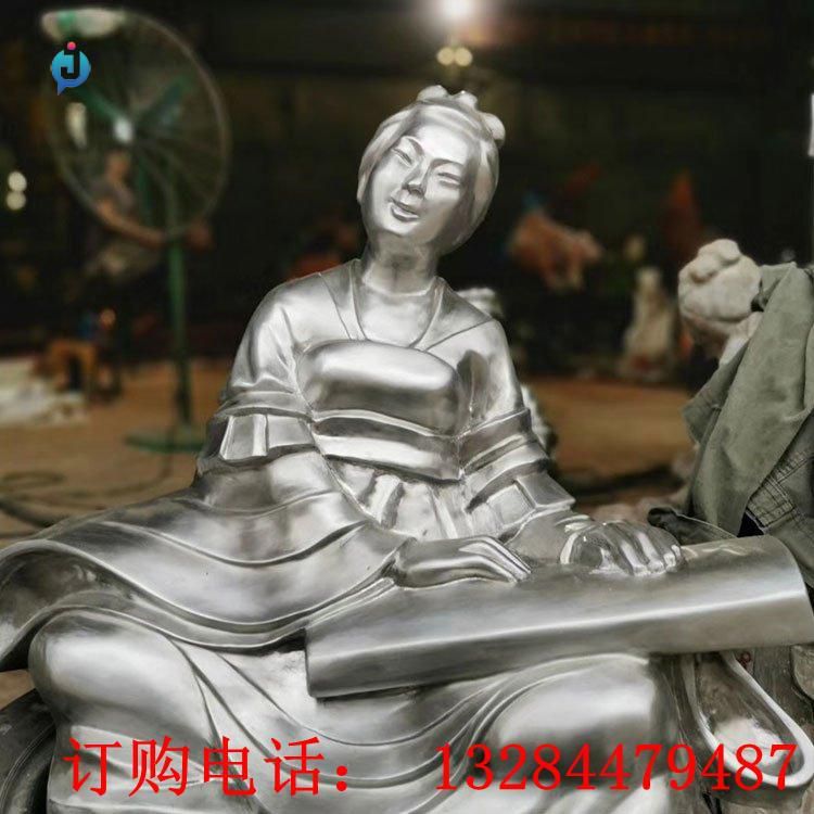 不銹鋼人物彈箏雕塑