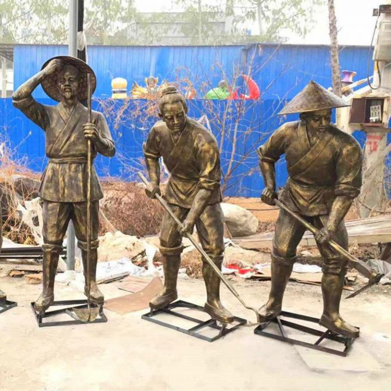 農(nóng)耕犁地人物抽象銅雕