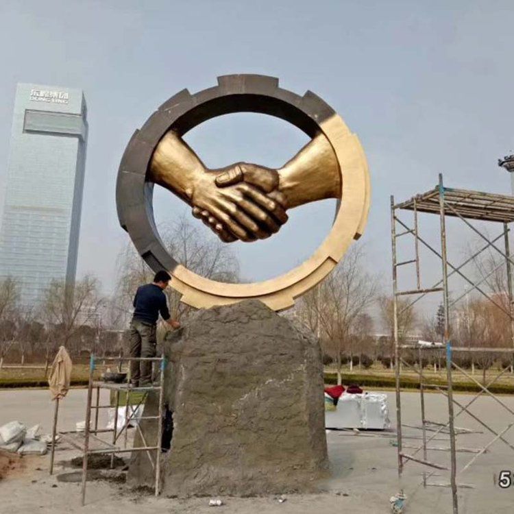 鏡面不銹鋼握手標(biāo)志雕塑